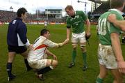 27 February 2005; Paul O'Connell, Ireland, commiserates with Martin Corry, England, after the final whistle. RBS Six Nations Championship 2005, Ireland v England, Lansdowne Road, Dublin. Picture credit; Brendan Moran / SPORTSFILE