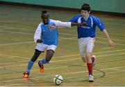 4 December 2013; Tony Mambouna, Limerick C.B.S, left, in action against Mark O'Dea, Breifne College. FAI All-Ireland Post Primary Schools First Year Futsal Finals, Franciscan College, Sports Centre, Gormanston, Co. Meath. Picture credit: Ramsey Cardy / SPORTSFILE
