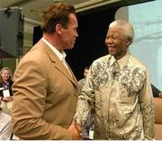 21 June 2003; Former South African President Nelson Mandela with actor Arnold Schwarzenegger at the Global Youth Summit, hosted by Timothy Shriver, President Special Olympics, in the Four Seasons Hotel, Ballsbridge, Dublin. Picture credit: Ray McManus / SPORTSFILE
