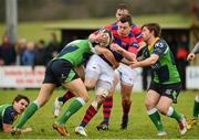7 December 2013; Killian Lett, Clontarf, is tackled by Dominic Gallagherand Stewart McMorrow, Ballinahinch. Ulster Bank League, Division 1A, Ballinahinch v Clontarf, Ballymacarn Park, Ballinahinch, Co. Antrim. Picture credit: Oliver McVeigh / SPORTSFILE