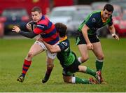 7 December 2013; David Joyce, Clontarf, is tackled by Dominic Gallagher, Ballinahinch. Ulster Bank League, Division 1A, Ballinahinch v Clontarf, Ballymacarn Park, Ballinahinch, Co. Antrim. Picture credit: Oliver McVeigh / SPORTSFILE