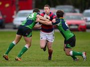 7 December 2013; David Joyce, Clontarf, is tackled by Stuart Morrow and Dominic Gallagher, Ballinahinch. Ulster Bank League, Division 1A, Ballinahinch v Clontarf, Ballymacarn Park, Ballinahinch, Co. Antrim. Picture credit: Oliver McVeigh / SPORTSFILE