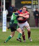 7 December 2013; Anthony Ryan, Clontarf, is tackled by Harry McAleese, Ballinahinch. Ulster Bank League, Division 1A, Ballinahinch v Clontarf, Ballymacarn Park, Ballinahinch, Co. Antrim. Picture credit: Oliver McVeigh / SPORTSFILE