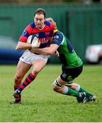 7 December 2013; Evan Ryan, Clontarf, is tackled by Paul Pritchard, Ballinahinch. Ulster Bank League, Division 1A, Ballinahinch v Clontarf, Ballymacarn Park, Ballinahinch, Co. Antrim. Picture credit: Oliver McVeigh / SPORTSFILE