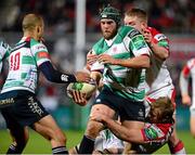 7 December 2013; Dean Budd, Treviso, is tackled by Tom Court and Roger Wilson, Ulster. Heineken Cup 2013/14, Pool 5, Round 3, Ulster v Treviso, Ravenhill Park, Belfast, Co. Antrim. Picture credit: Oliver McVeigh / SPORTSFILE