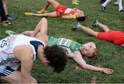 8 December 2013; Ireland's Sean Tobin lies on the ground after finishing in 9th place in the Men's Junior Race during the Spar European Cross Country Championships 2013. Friendship Park, Belgrade, Serbia. Picture credit: Brendan Moran / SPORTSFILE