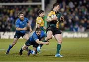 7 December 2013; George North, Northampton Saints, is tackled by Brian O'Driscoll, Leinster. Heineken Cup 2013/14, Pool 1, Round 3, Northampton Saints v Leinster. Franklins Gardens, Northampton, England. Picture credit: Stephen McCarthy / SPORTSFILE