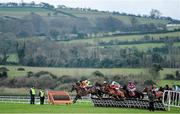 8 December 2013; Clonard Lad, with Ruby Walsh up, leads the field over the first during the  www.punchestown.com Rated Novice Hurdle. Punchestown Racecourse, Punchestown, Co. Kildare. Picture credit: Ramsey Cardy / SPORTSFILE