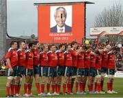8 December 2013; The Munster players stand for a minute silence in memory of the late South African President Nelson Mandela. Heineken Cup 2013/14, Pool 6, Round 3, Munster v Perpignan, Thomond Park, Limerick. Picture credit: Matt Browne / SPORTSFILE