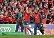 8 December 2013; Munster's Conor Murray leaves the field with an injury in the first half. Heineken Cup 2013/14, Pool 6, Round 3, Munster v Perpignan, Thomond Park, Limerick. Picture credit: Diarmuid Greene / SPORTSFILE
