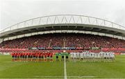 8 December 2013; Munster and Perpignan players observe a minute silence in memory of the late President of South Africa Nelson Mandela. Heineken Cup 2013/14, Pool 6, Round 3, Munster v Perpignan, Thomond Park, Limerick. Picture credit: Diarmuid Greene / SPORTSFILE