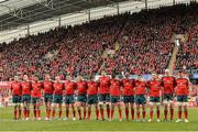 8 December 2013; Munster players observe a minute silence in memory of the late President of South Africa Nelson Mandela. Heineken Cup 2013/14, Pool 6, Round 3, Munster v Perpignan, Thomond Park, Limerick. Picture credit: Diarmuid Greene / SPORTSFILE