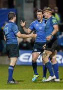 7 December 2013; Brian O'Driscoll, left, is congratulated by his Leinster team-mates Zane Kirchner and Jamie Heaslip, right, after scoring a try. Heineken Cup 2013/14, Pool 1, Round 3, Northampton Saints v Leinster. Franklins Gardens, Northampton, England. Picture credit: Stephen McCarthy / SPORTSFILE