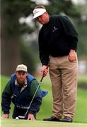 22 August 1998; Darren Clarke of Northern Ireland assisted by his caddy line up a putt during the third round of the Smurfit European Open at The K Club in Straffan, Kildare. Photo by Matt Browne/Sportsfile