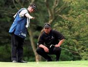 22 August 1998; Darren Clarke of Northern Ireland assisted by his caddy line up a putt during the third round of the Smurfit European Open at The K Club in Straffan, Kildare. Photo by Matt Browne/Sportsfile