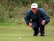 17 June 1998; Eddie Power lines up a putt on the 4th green during the final of the Irish Amateur Close Golf Championship, sponsored by Bank of Ireland, at The Island Golf Club in Donabate, Dublin. Photo by Matt Browne/Sportsfile