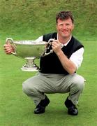 17 June 1998; Winner of the Irish Amateur Close Championship Eddie Power poses with the trophy during the final of the Irish Amateur Close Golf Championship, sponsored by Bank of Ireland, at The Island Golf Club in Donabate, Dublin. Photo by Matt Browne/Sportsfile