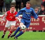 7 February 1999; Eoin Bennis of UCD in action against Keith Doyle of St Patrick's Athletic during the Harp Larger FAI Cup Second Round match between St Patrick's Athletic and UCD at Richmond Park in Dublin. Photo by Damien Eagers/Sportsfile