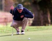 15 October 1998; Francis Howley lines up a putt on the 2nd green during the first round of the Irish PGA Golf Championship at Powerscourt Golf Club in Enniskerry, Wicklow. Photo by Matt Browne/Sportsfile