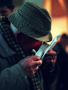 18 January 1997; A punter examines his racecard during a greyhound racing meeting at Shelbourne Park in Dublin. Photo by David Maher/Sportsfile