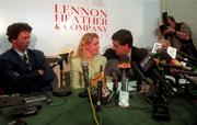 29 April 1998; Michelle Smith de Bruin accompanied by her husband and coach Eirk de Bruin, left, and solicitor Peter Lennon, right, during a press conference at Lennon Heather & Company Solicitors in Dublin. Photo by Brendan Moran/Sportsfile