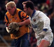 14 February 1999; Niall Sheridan of Longford in action against Ciaran Brad of Cavan during the Church and General National Football League Division 2 match between Cavan and Longford at Breffni Park in Cavan. Photo by Ray McManus/Sportsfile
