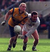 14 February 1999; Niall Sheridan of Longford in action against Ciaran Brady of Cavan during the Church and General National Football League Division 2 match between Cavan and Longford at Breffni Park in Cavan. Photo by Ray McManus/Sportsfile