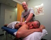 9 March 1998; Irish swimmer Nick O'Hare receives a massage from masseur Paul Muldowney during a training session at Blanchardstown in Dublin. Photo by Matt Browne/Sportsfile