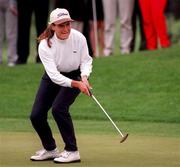 29 June 1997; Patricia Meunier Lebouc of France urges the ball towards the hole for an eagle on the 17th green during the final round of the Guardian Ladies Irish Open at Luttrellstown Castle Golf Course in Dublin. Photo by Brendan Moran/Sportsfile