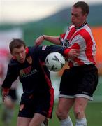 14 February 1999; Trevor Molloy of St Patrick's Athletic in action against Paul Curran of Derry City during the Harp Lager National League Premier Division match between Derry City and St Patrick's Athletic at The Bradywell in Derry. Photo by David Maher/Sportsfile