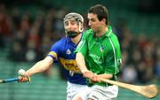 27 February 2005; James O'Brien, Limerick, in action against Philip Maher, Tipperary. Allianz National Hurling League, Division 1B, Limerick v Tipperary, Gaelic Grounds, Limerick. Picture credit; Kieran Clancy / SPORTSFILE