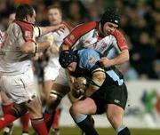 4 March 2005; Kevin Tkachuk, Glasgow Rugby, is tackled by Matt McCullough, Ulster. Celtic League 2004-2005, Pool 1, Ulster v Glasgow Rugby, Ravenhill, Belfast. Picture credit; Matt Browne / SPORTSFILE