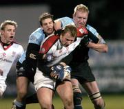 4 March 2005; Roger Wilson, Ulster, is tackled by Rory Lamont, left and Cameron Mather, Glasgow Rugby. Celtic League 2004-2005, Pool 1, Ulster v Glasgow Rugby, Ravenhill, Belfast. Picture credit; Matt Browne / SPORTSFILE