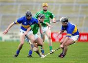 27 February 2005; Niall Moran, Limerick, in action against Colin Morrissey, right and Hugh Moloney, Tipperary. Allianz National Hurling League, Division 1B, Limerick v Tipperary, Gaelic Grounds, Limerick. Picture credit; Kieran Clancy / SPORTSFILE