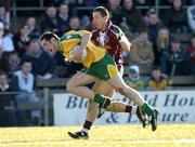 6 March 2005; Brendan Devenney, Donegal, is tackled by John Keane, Westmeath. Allianz National Football League, Division 1A, Westmeath v Donegal, Cusack Park, Mullingar, Co. Westmeath. Picture credit; Matt Browne / SPORTSFILE