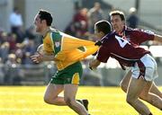 6 March 2005; Brendan Devenney, Donegal, is tackled by John Keane, 4, and Damien Healy, Westmeath. Allianz National Football League, Division 1A, Westmeath v Donegal, Cusack Park, Mullingar, Co. Westmeath. Picture credit; Matt Browne / SPORTSFILE