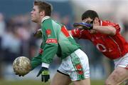6 March 2005; Aidan Kilcoyne, Mayo, in action against Noel O'Leary, Cork. Allianz National Football League, Division 1A, Mayo v Cork, James Stephen's Park, Ballina, Co. Mayo. Picture credit; David Maher / SPORTSFILE
