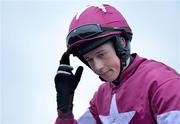 8 December 2013; Jockey Bryan Cooper after winning the Setanta Sports €1 Offer Beginners Steeplechase aboard Bright New Dawn. Punchestown Racecourse, Punchestown, Co. Kildare. Picture credit: Ramsey Cardy / SPORTSFILE