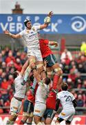 8 December 2013; Luke Charteris, Perpignan, wins possession for his side in a lineout ahead of Donncha O'Callaghan, Munster. Heineken Cup 2013/14, Pool 6, Round 3, Munster v Perpignan, Thomond Park, Limerick. Picture credit: Matt Browne / SPORTSFILE