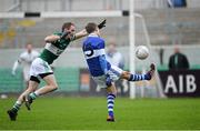 8 December 2013; Tomas Quinn, St.Vincents, beats Thomas Fitzgerald, Portlaoise, to score his side's second last point of the game. AIB Leinster Senior Club Football Championship Final, Portlaoise, Laois v St Vincent's, Dublin, O'Connor Park, Tullamore, Co. Offaly. Picture credit: David Maher / SPORTSFILE