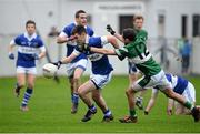 8 December 2013; Michael Concarr, St.Vincents, in action against Brian Glynn, Portlaoise. AIB Leinster Senior Club Football Championship Final, Portlaoise, Laois v St Vincent's, Dublin, O'Connor Park, Tullamore, Co. Offaly. Picture credit: David Maher / SPORTSFILE
