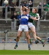 8 December 2013; Eamon Fennell, St.Vincents, in action against Brian Glynn, Portlaoise. AIB Leinster Senior Club Football Championship Final, Portlaoise, Laois v St Vincent's, Dublin, O'Connor Park, Tullamore, Co. Offaly. Picture credit: David Maher / SPORTSFILE