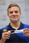 9 December 2013; Leinster's Ian Madigan draws the name of Kilkenny College during the Beauchamps Leinster Schools Cup Draw. Beauchamps Solicitors, Riverside Two, Sir John Rogerson's Quay, Dublin. Picture credit: Stephen McCarthy / SPORTSFILE