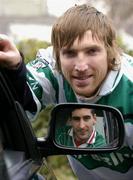 9 March 2005; Colm Parkinson, Portlaoise, and Brian Ruane, reflected in a car mirror, Ballina Stephenites, at a photocall in advance of the AIB All Ireland Club Championship finals to be held on St. Patrick's Day. The winning team in the Hurling and Football finals will each receive a Toyota Corolla as part of Toyota's role as &quot;Official Car Supplier to the GAA&quot;. Toyota Motor Centre, Ballsbridge, Dublin. Picture credit; David Maher / SPORTSFILE