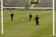 11 March 2005; Ronan O'Gara in action during kicking practice watched by David Humphreys, left, and kicking coach Mark Tainton. Ireland squad kicking practice, Lansdowne Road, Dublin. Picture credit; Matt Browne / SPORTSFILE