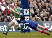12 March 2005; Denis Hickie, Ireland, is tackled by Benoit Baby, France. RBS Six Nations Championship 2005, Ireland v France, Lansdowne Road, Dublin. Picture credit; Matt Browne / SPORTSFILE