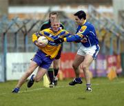12 March 2005; David Russell, Clare, in action against Arthur O'Connor, Longford. Allianz National Football League, Division 2A, Clare v Longford, Cusack Park, Ennis, Co. Clare. Picture credit; Ray McManus / SPORTSFILE
