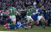 12 March 2005; Brian O'Driscoll, Ireland, is tackled by Frederic Michalak (21), France. RBS Six Nations Championship 2005, Ireland v France, Lansdowne Road, Dublin. Picture credit; Brendan Moran / SPORTSFILE