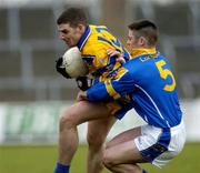 12 March 2005; Brendan Crowley, Clare, in action against Shane Mulligan, Longford. Allianz National Football League, Division 2A, Clare v Longford, Cusack Park, Ennis, Co. Clare. Picture credit; Ray McManus / SPORTSFILE