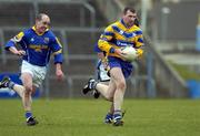 12 March 2005; Brian Considine, Clare, in action against Padraic Davis, Longford. Allianz National Football League, Division 2A, Clare v Longford, Cusack Park, Ennis, Co. Clare. Picture credit; Ray McManus / SPORTSFILE